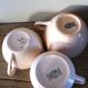 A set of 3 pink earthenware cups from Digoin Sarreguemines.