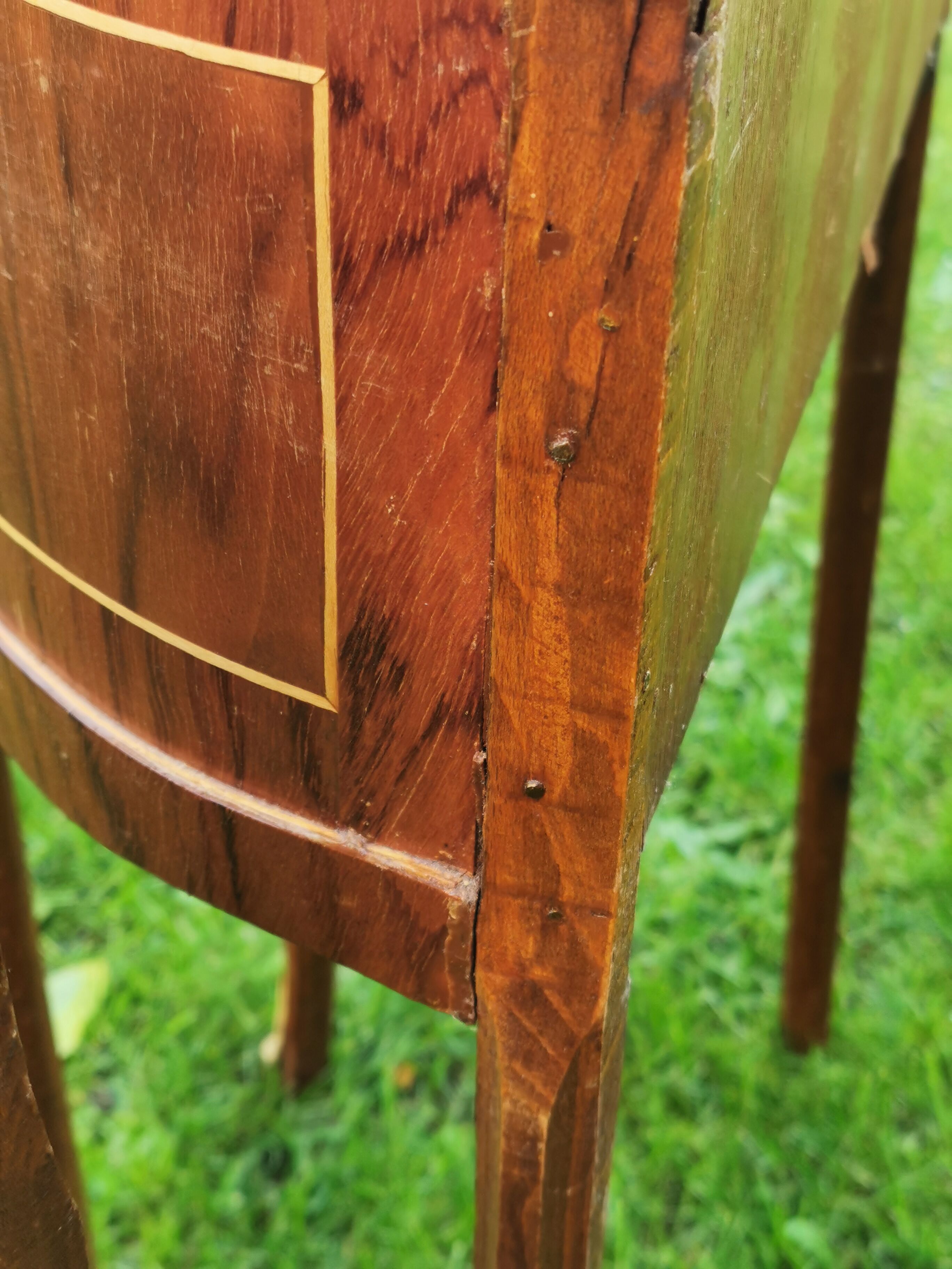 half-moon bedside pair in marquetry, bronze ornaments