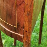 half-moon bedside pair in marquetry, bronze ornaments
