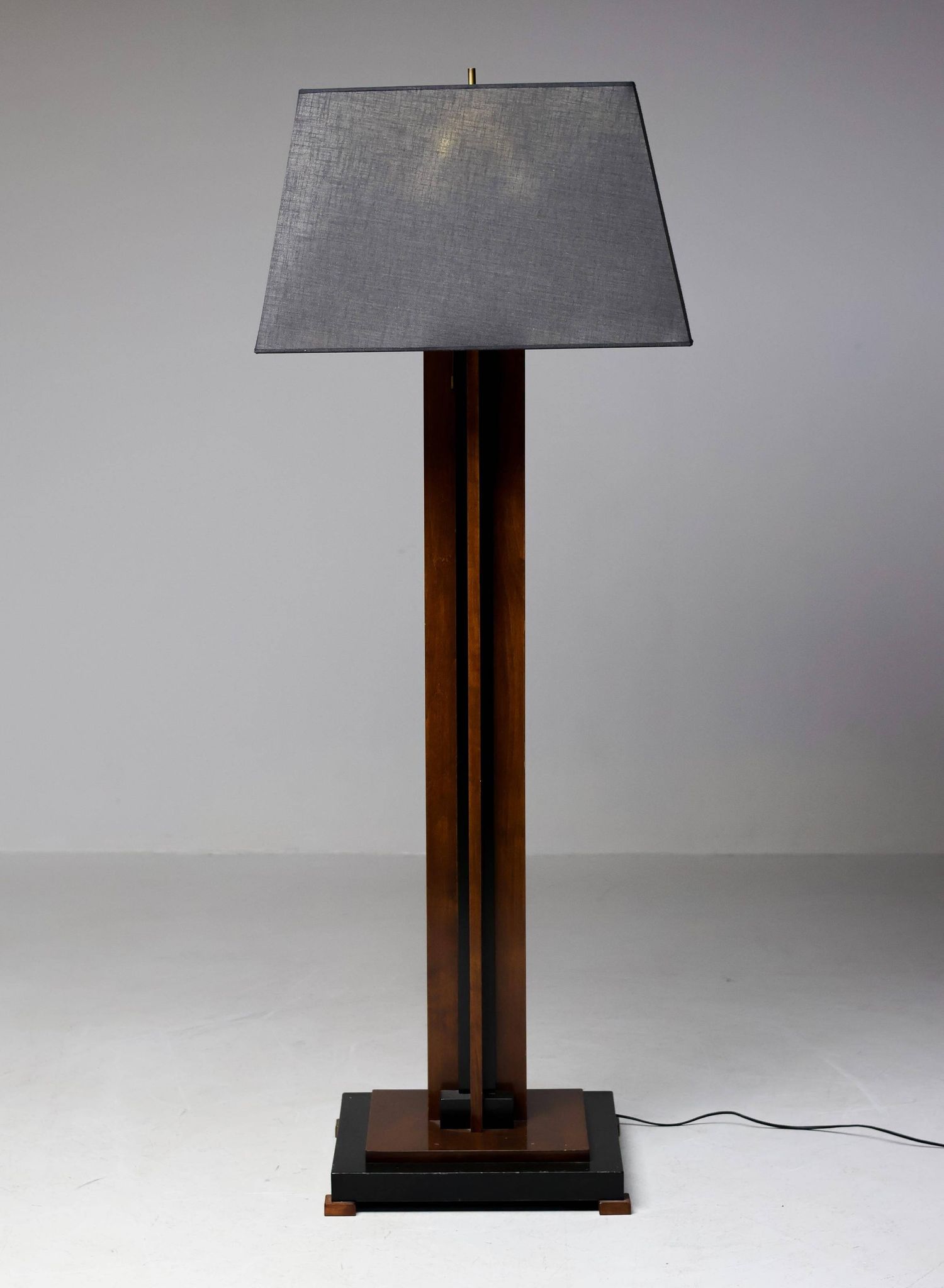 Amsterdam School floor lamp in partially ebonised cherry with a black linen shade.