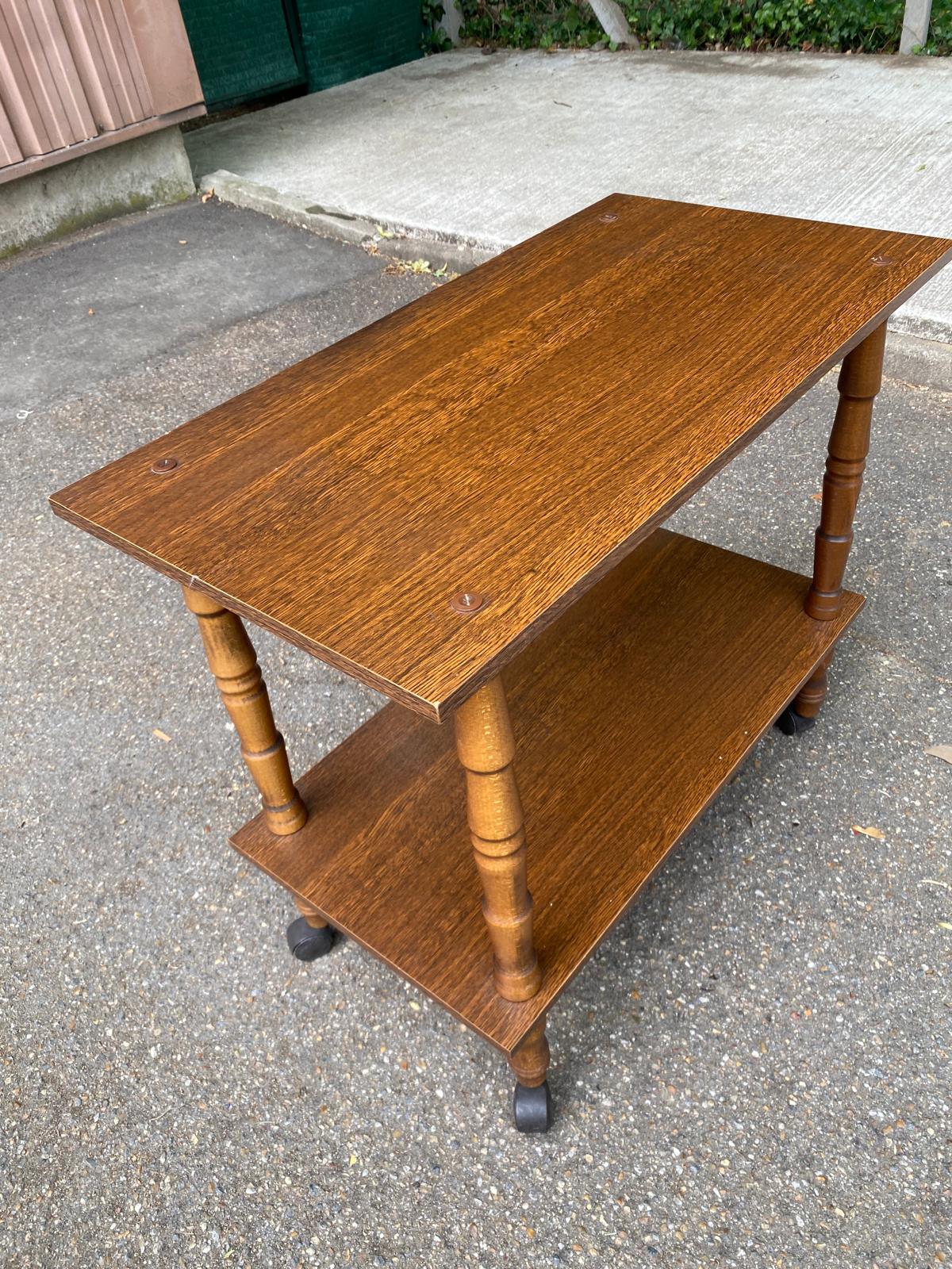 Vintage wooden rolling dessert trolley from the 1980s.