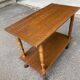 Vintage wooden rolling dessert trolley from the 1980s.