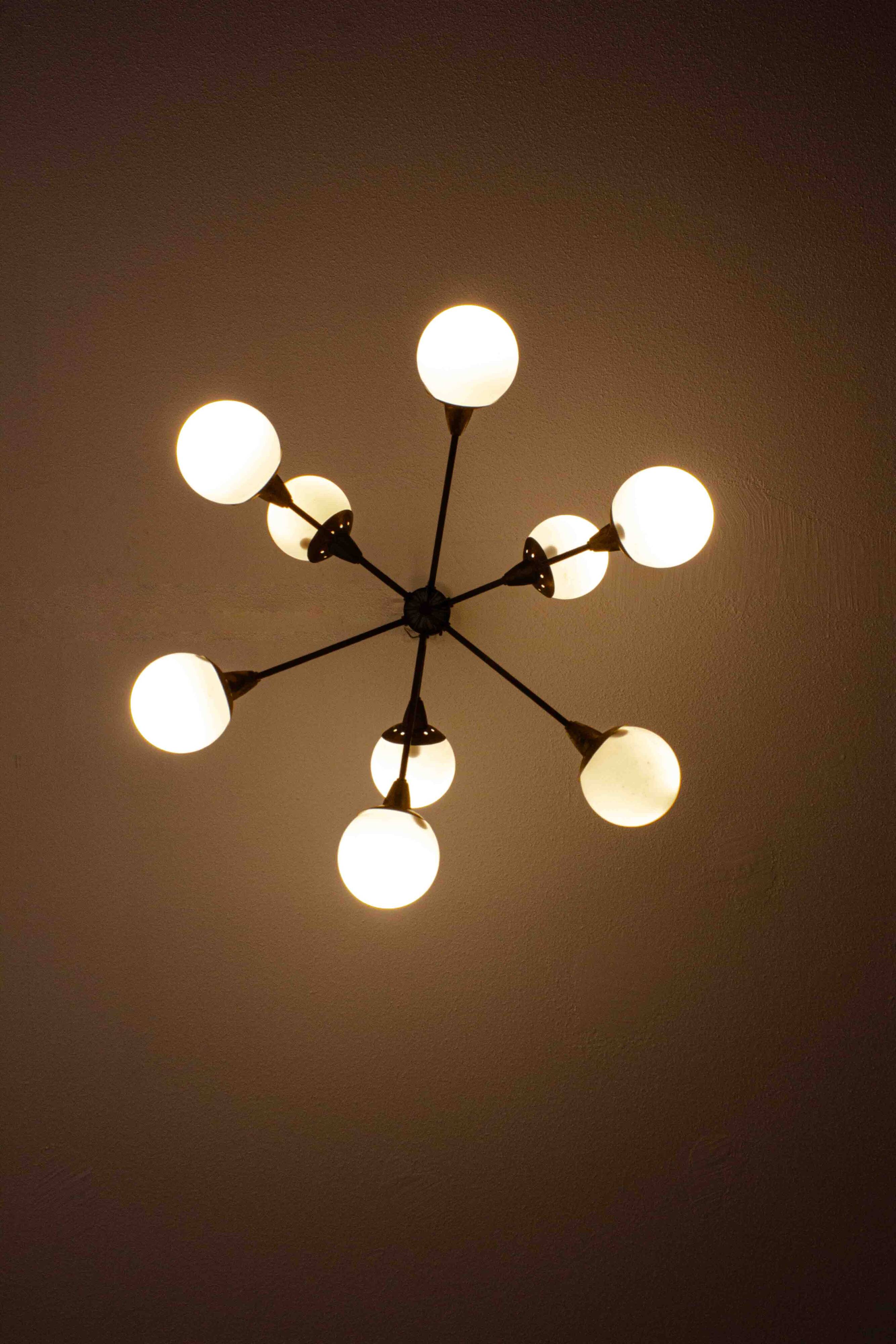 Impressive brass chandelier with opaline globes, Italy 1960s