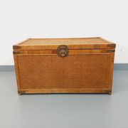 Vintage trunk in wood, rattan, caning, and brass.