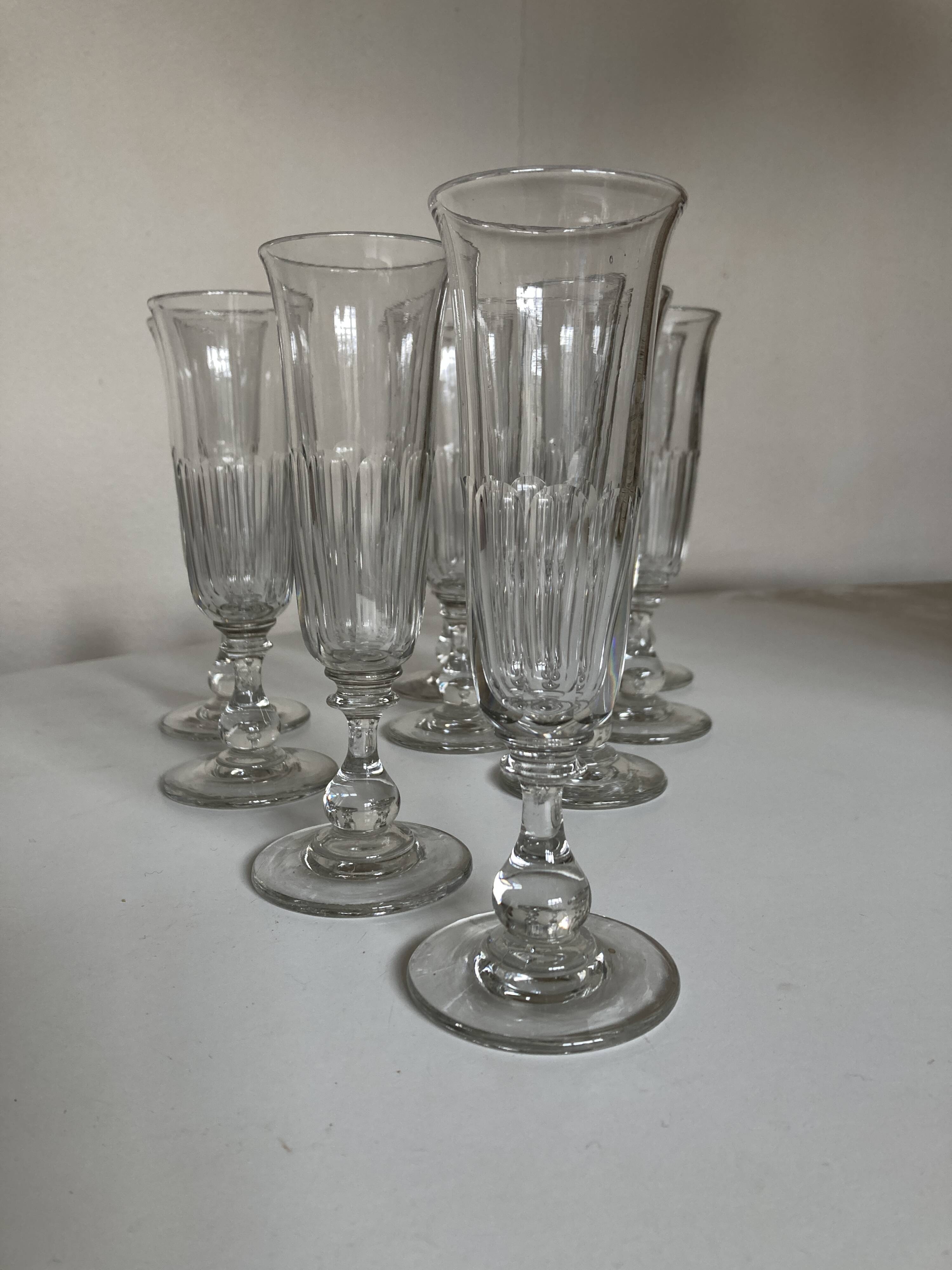 Set of 9 Louis Philippe tulip champagne flutes with flat sides mid 19th