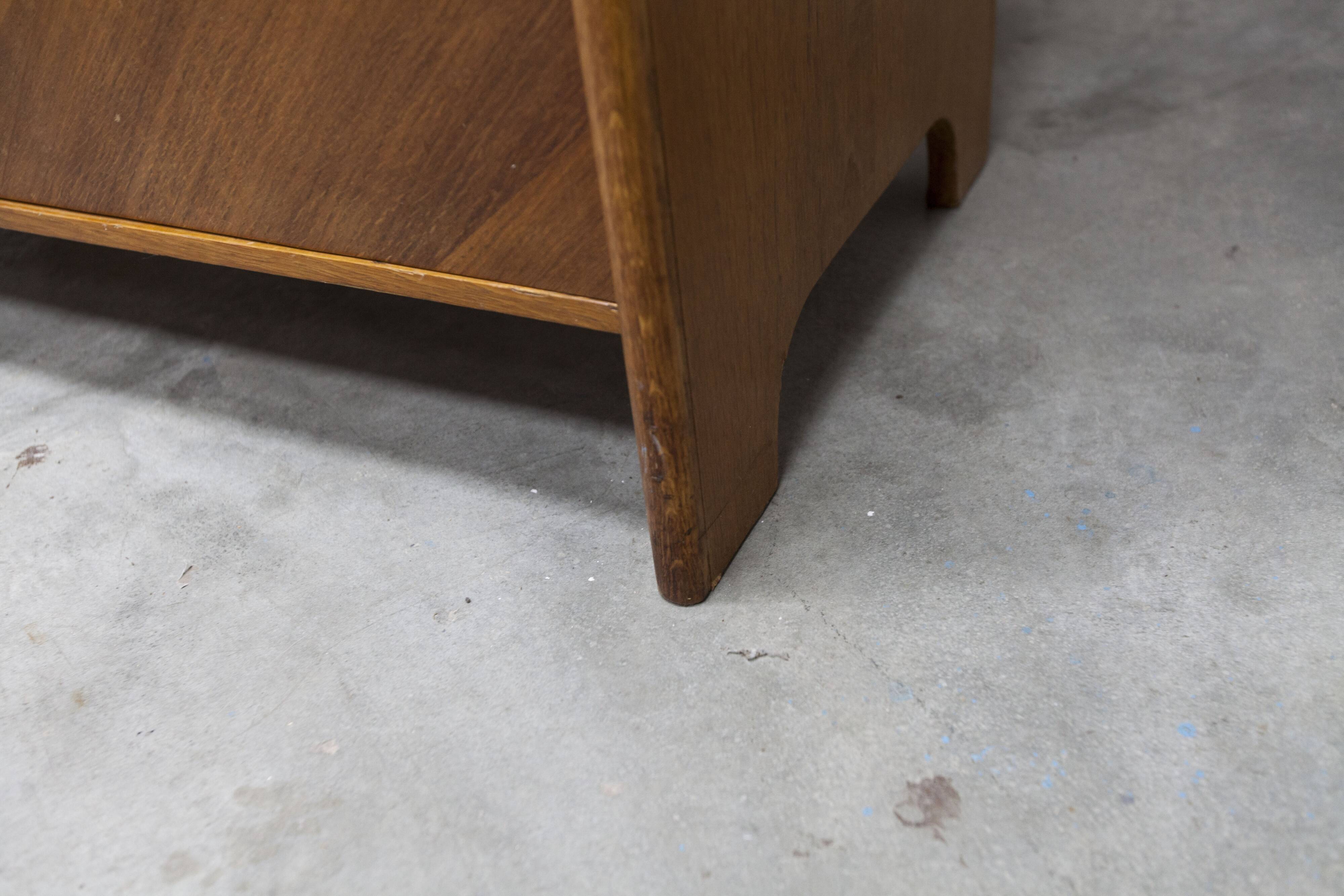 1950s Mid-Century Modern oak armoire with two doors and two drawers.