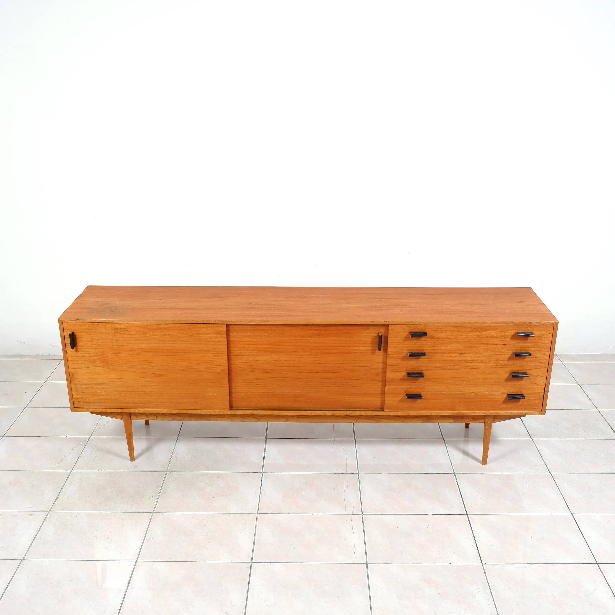Swedish teak sideboard with leather handles