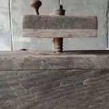 antique workbench with one drawer and two vices