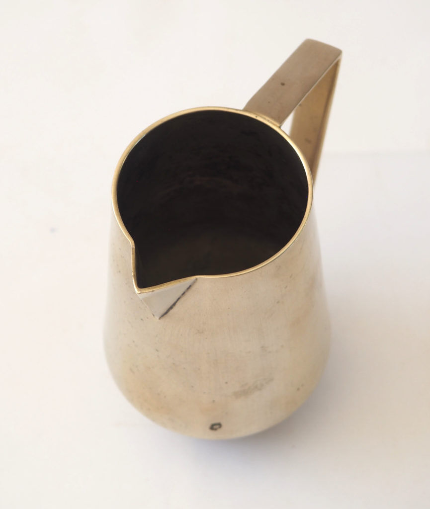 Duo of bronze pitchers