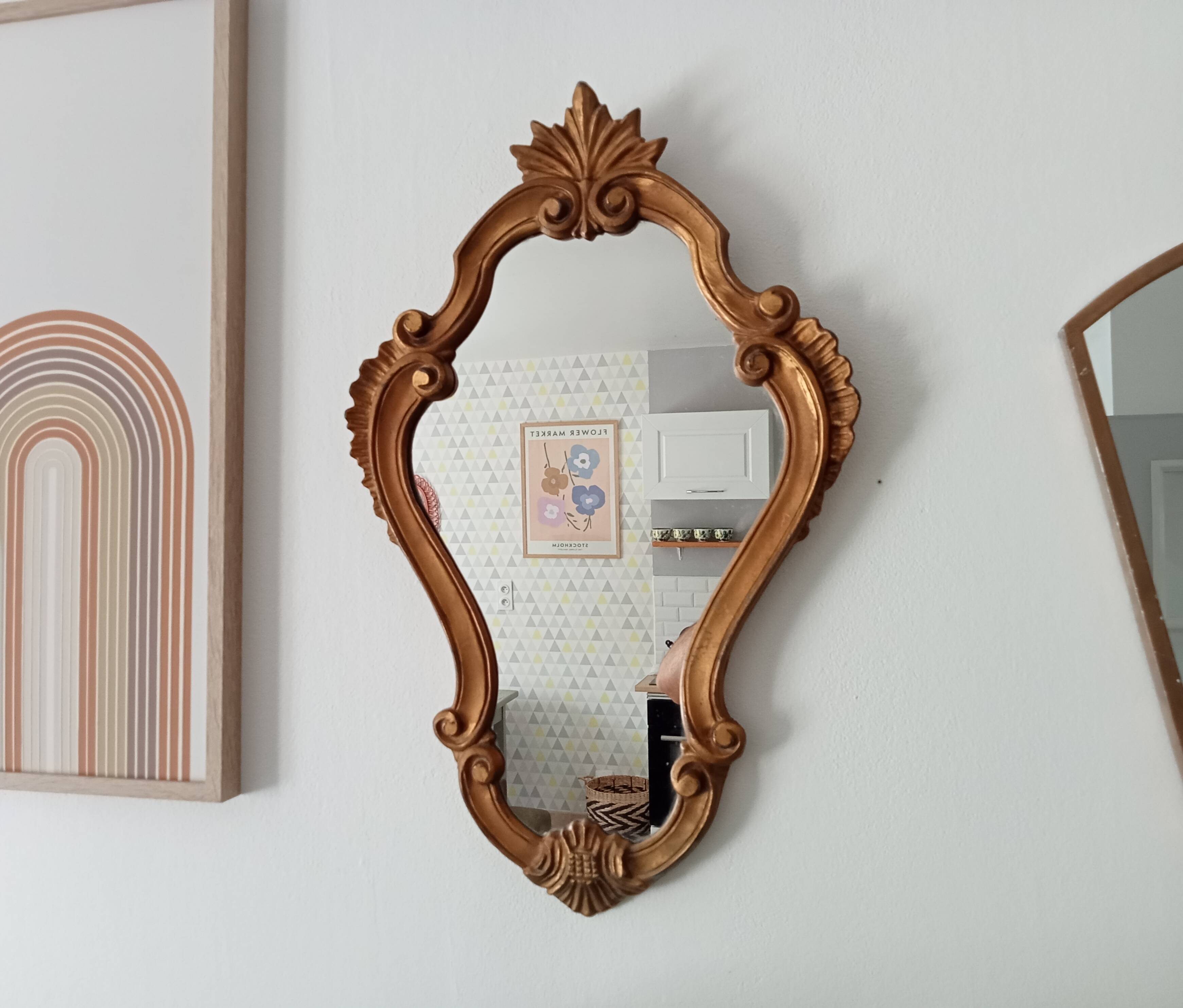 Italian baroque mirror in gilded resin from the 60s