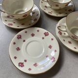 4 porcelain cups and saucers
