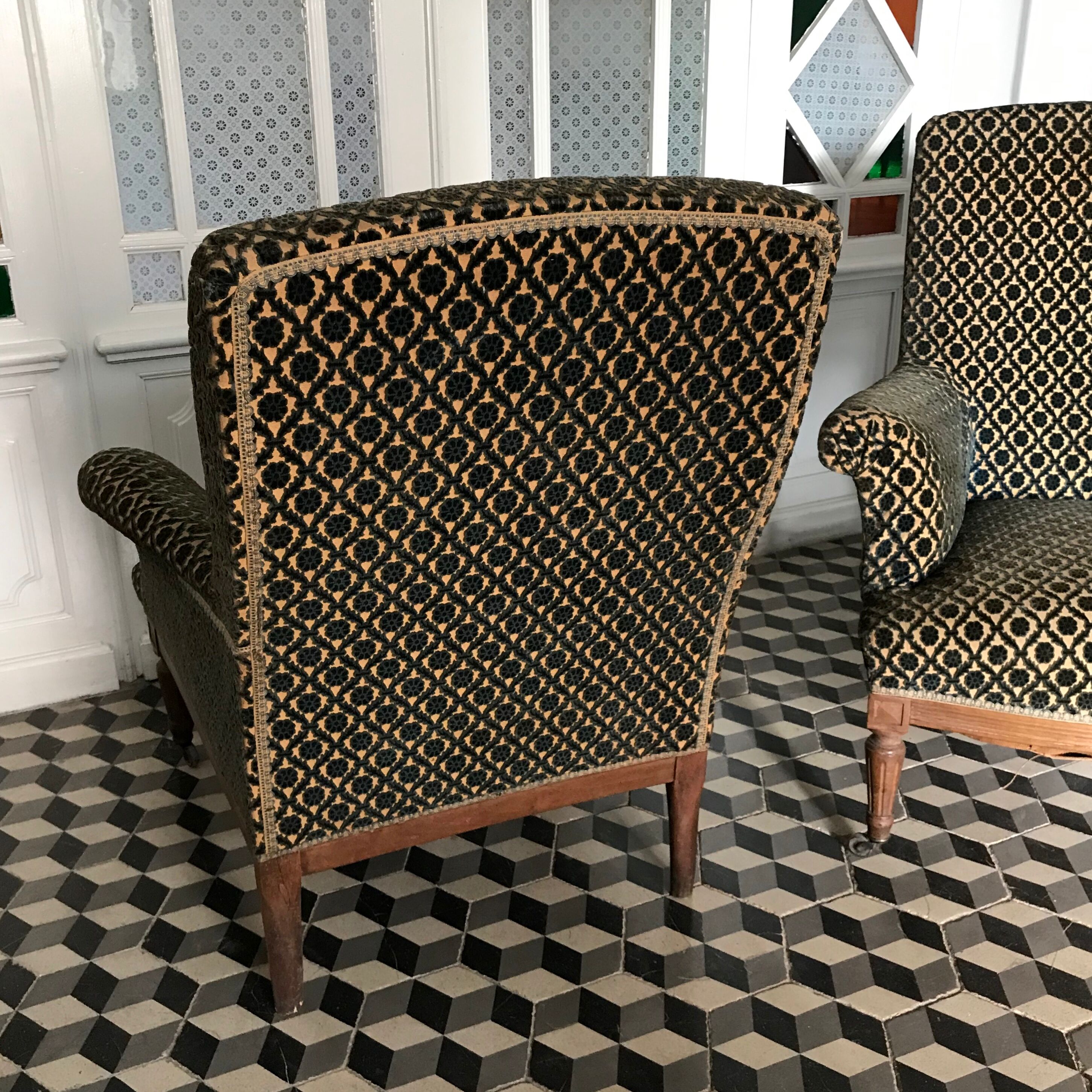 Vintage armchairs and rests feet