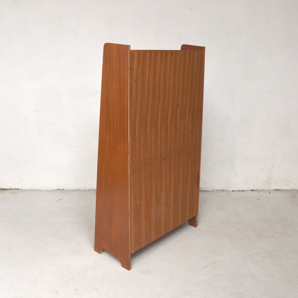 Shelf with winged feet, 1950