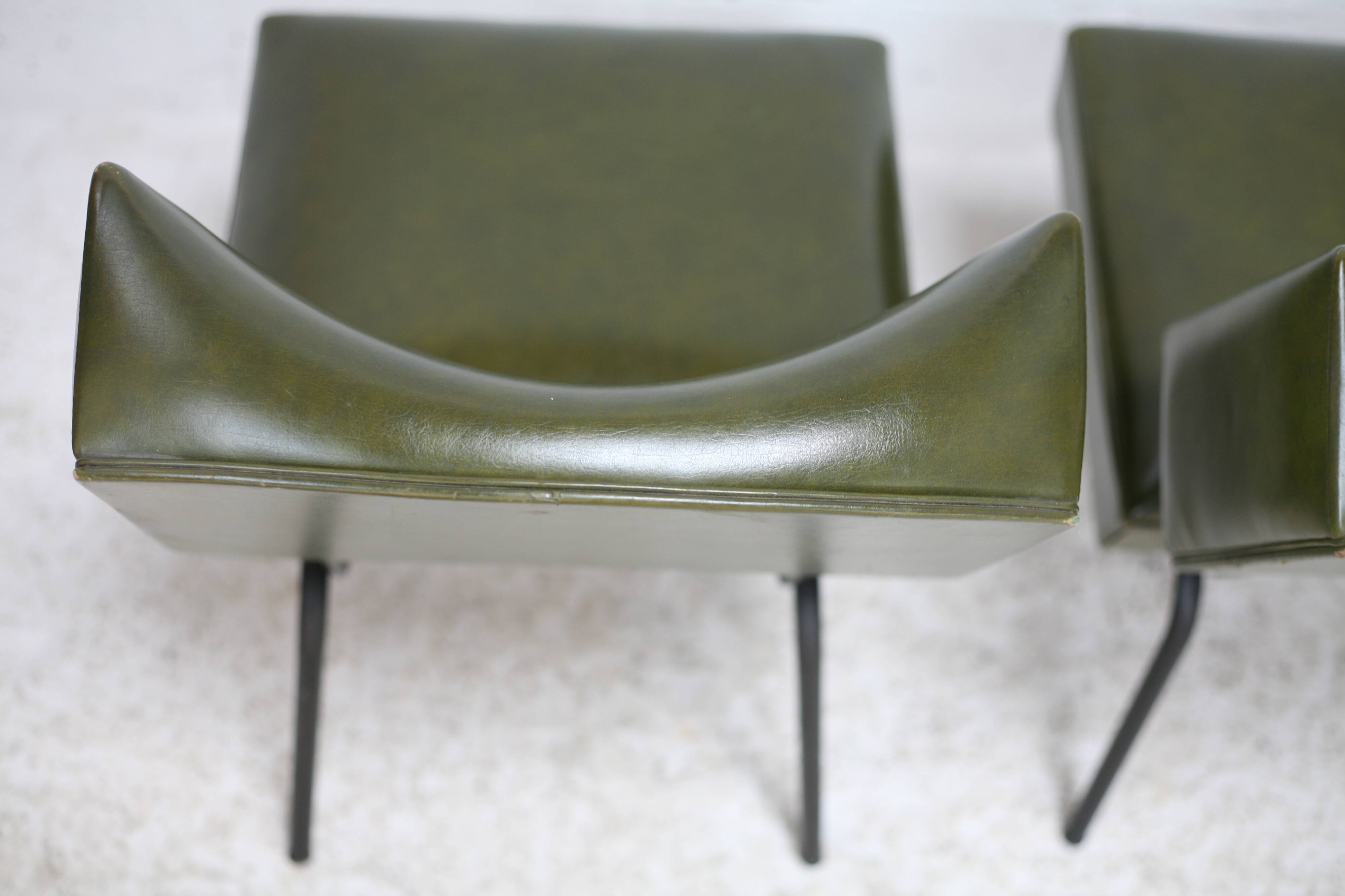 Pair of tubular armchairs, imitation leather. Circa 1950