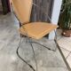 1 Linda armchair chair by Arrben in camel brown leather with a chrome steel frame.