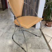 1 Linda armchair chair by Arrben in camel brown leather with a chrome steel frame.