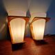 Pair of Philips teak and opaline wall lights, designed by Louis Kalff, 1950