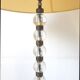 Art deco floor lamp in oak and glass