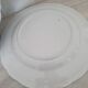 4 earthenware plates with floral and pastoral scene motif