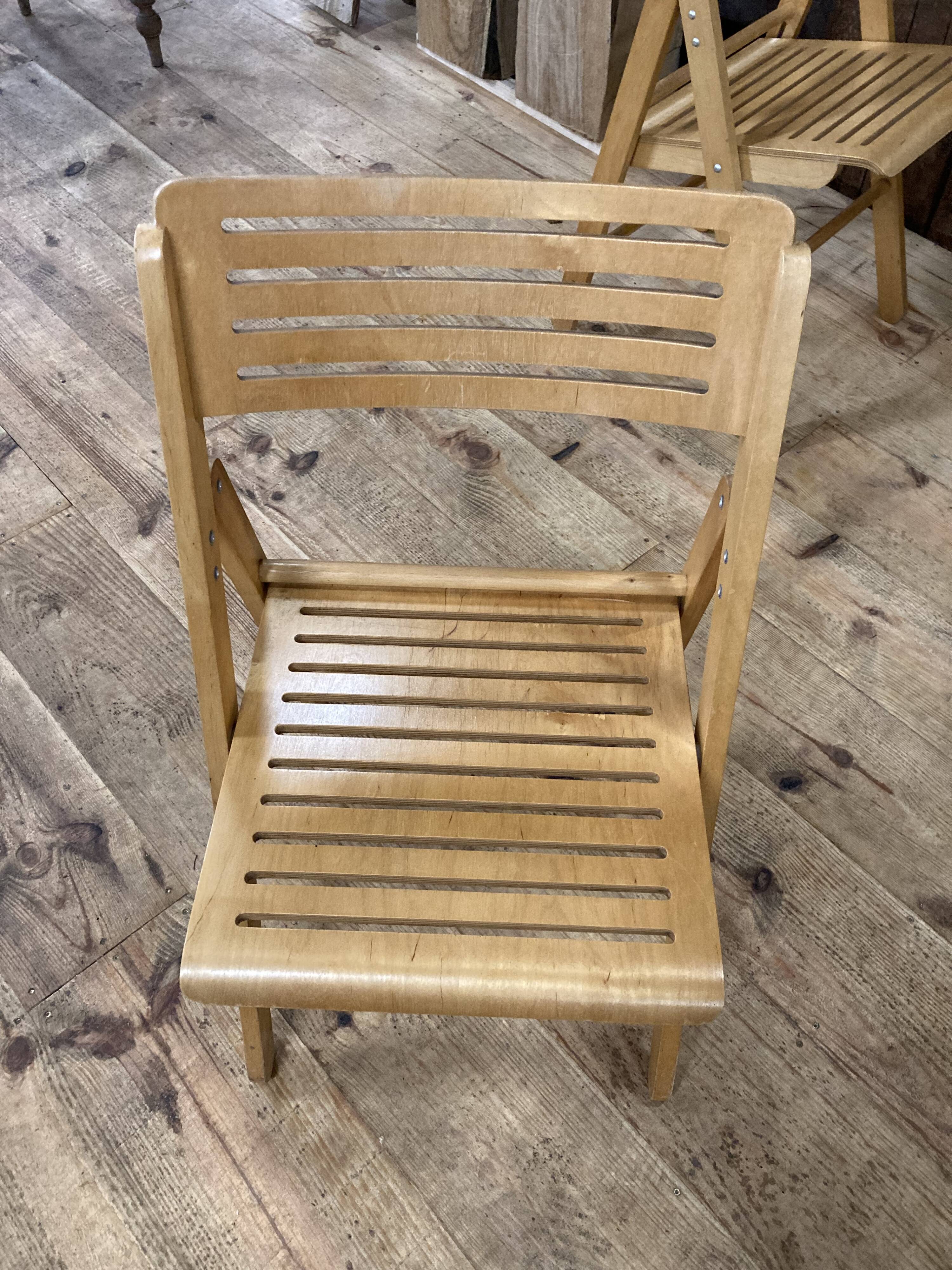 Pair of 90s folding Scandinavian wooden chairs