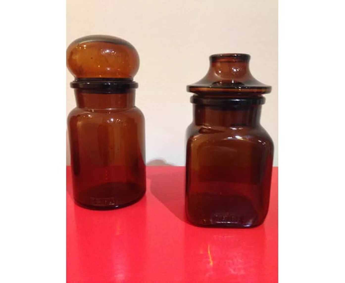 Pair of old amber glass jars