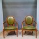 Pair of Louis XVI style leather armchairs