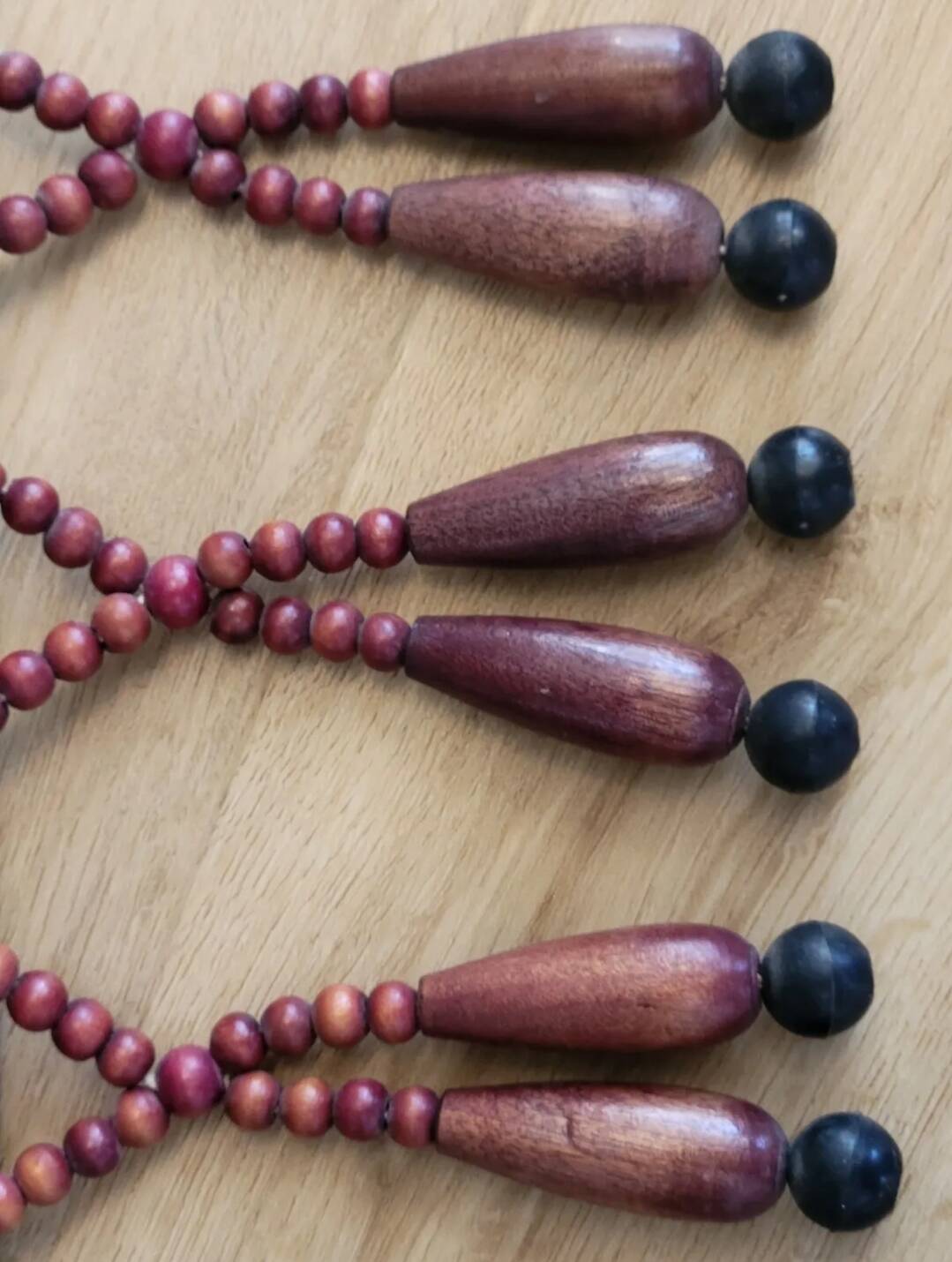 Miroir bohème vintage en perles de bois