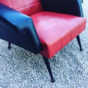 Vintage armchair in red and black skaï from the 1960s