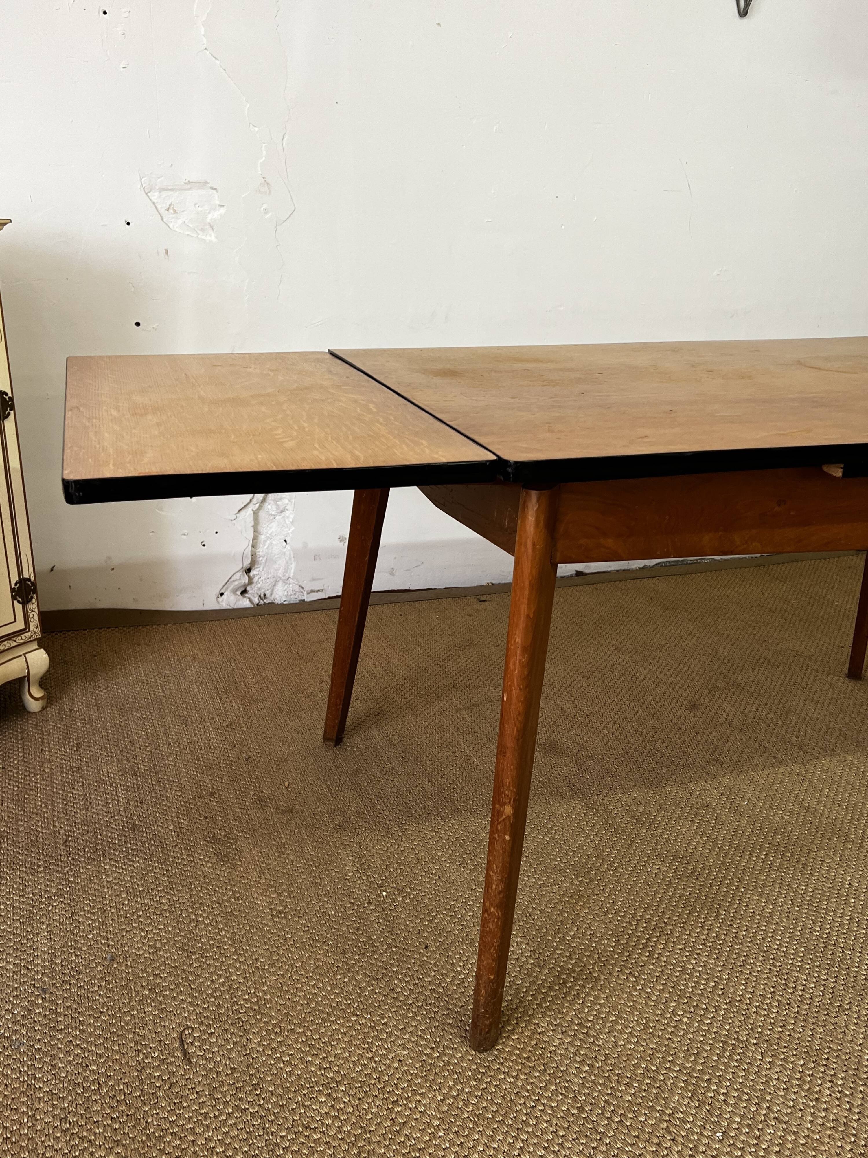Vintage wooden table with extensions