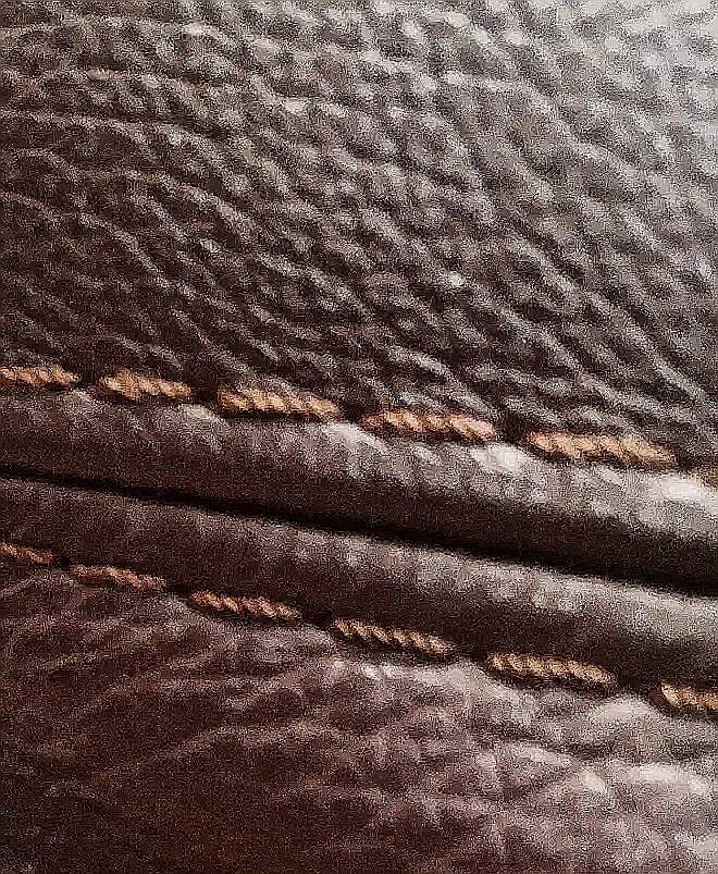 Roche Bobois armchair in brown leather