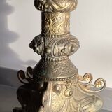 Large bronze candlestick with tripod and winged dog decoration, 19th century.