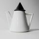 Vintage ceramic coffee pot or teapot from the 1980s, postmodern Memphis design, black and white triangles.