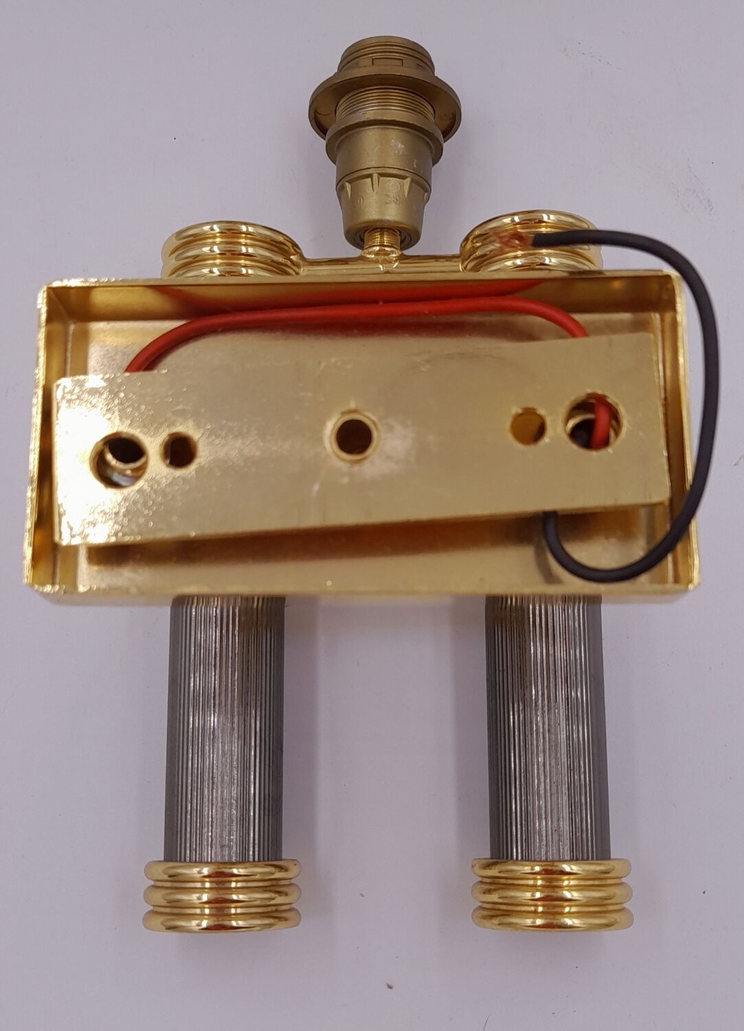 Pair of designer golden brass wall lights with gun barrel decor