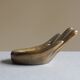 Empty-pocket brass hand