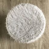 Vintage brass pouf with fur.