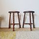 Wooden tripod stools - pair of turned leg bedside tables