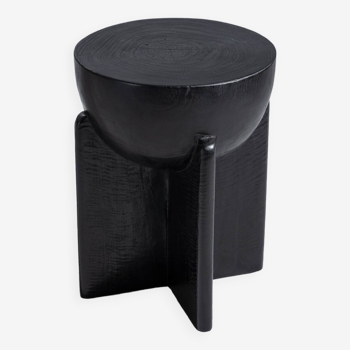 End table, blackened mango wood stool, semi-circular seat with crossed base