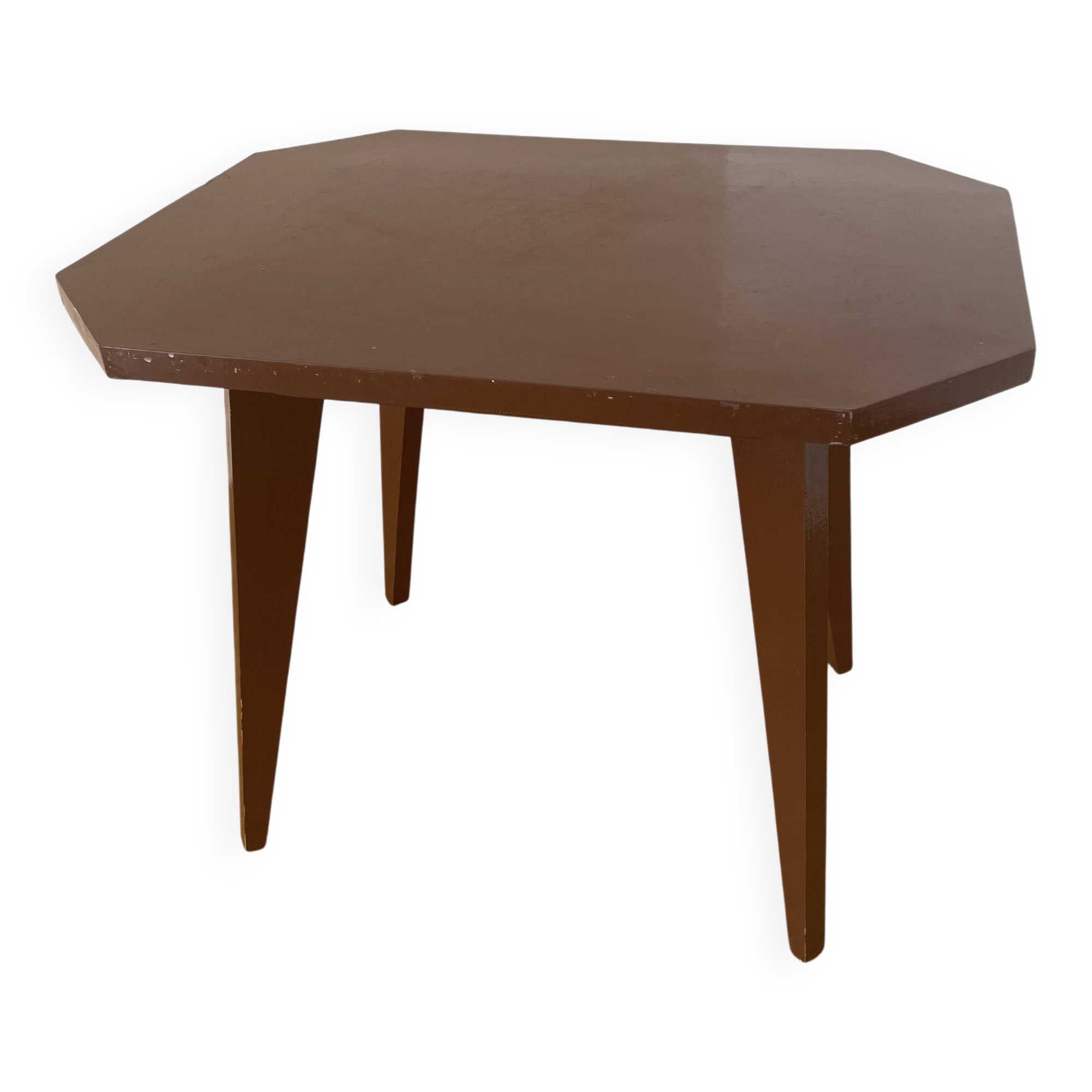 Brown coffee table with tapered legs.