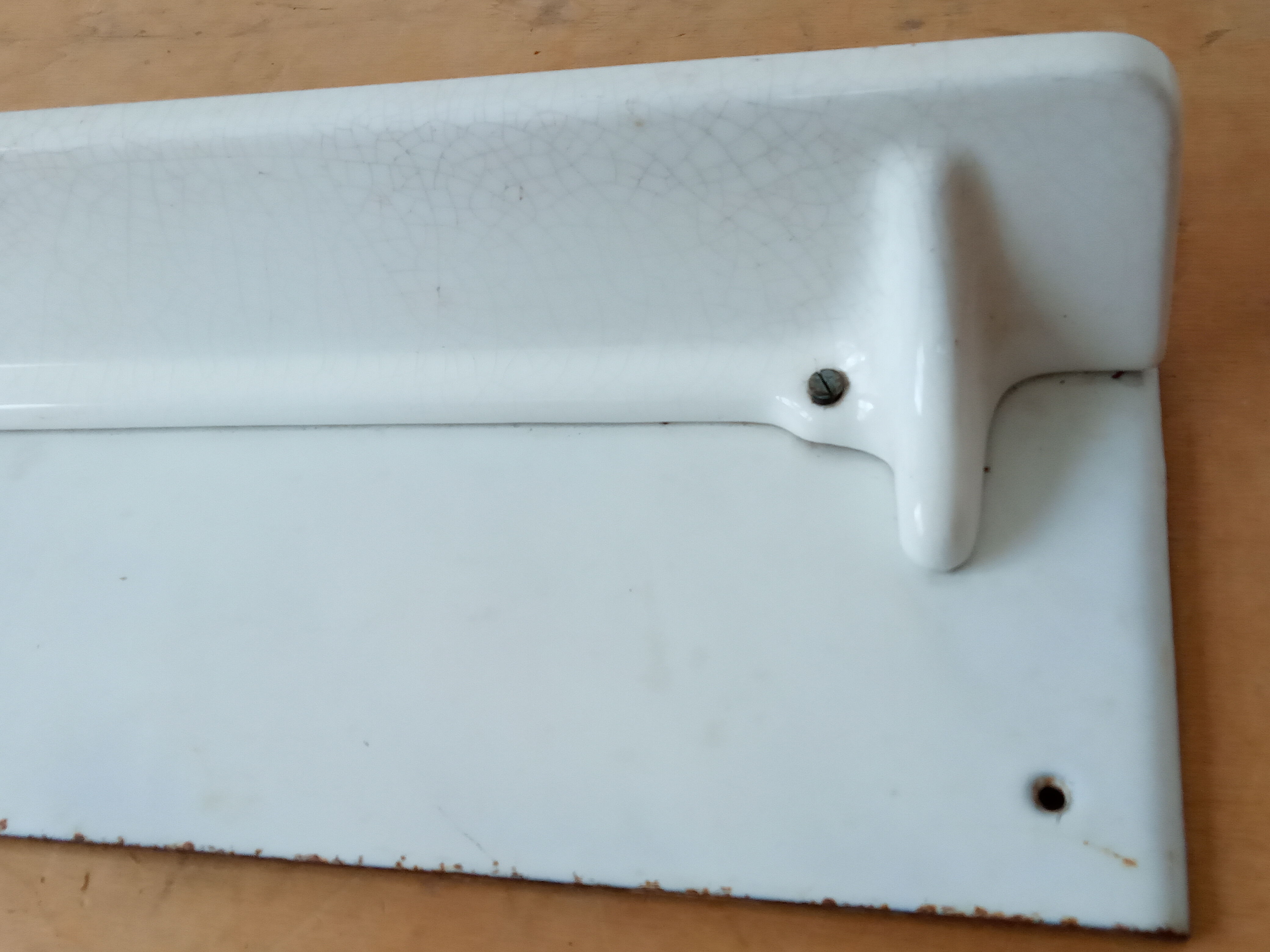 Earthenware shelf and enamelled cast iron