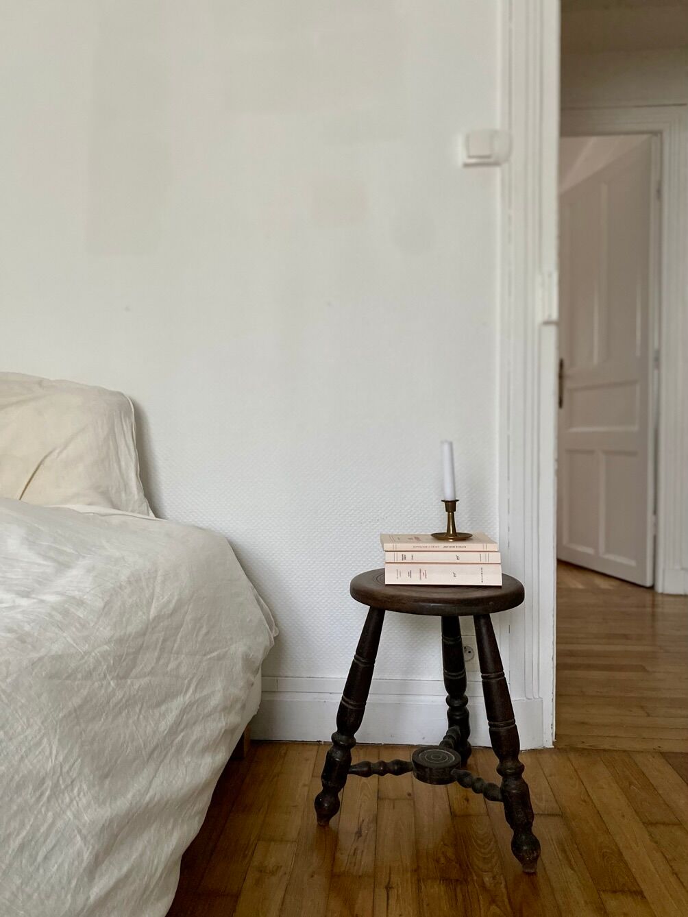 Turned wooden tripod stool