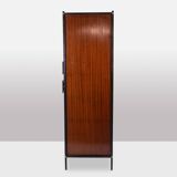 Pair of mahogany veneer and black lacquered iron cabinets. 1950s.