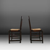 Set of six oak an wicker dining chairs by Victor Courtray