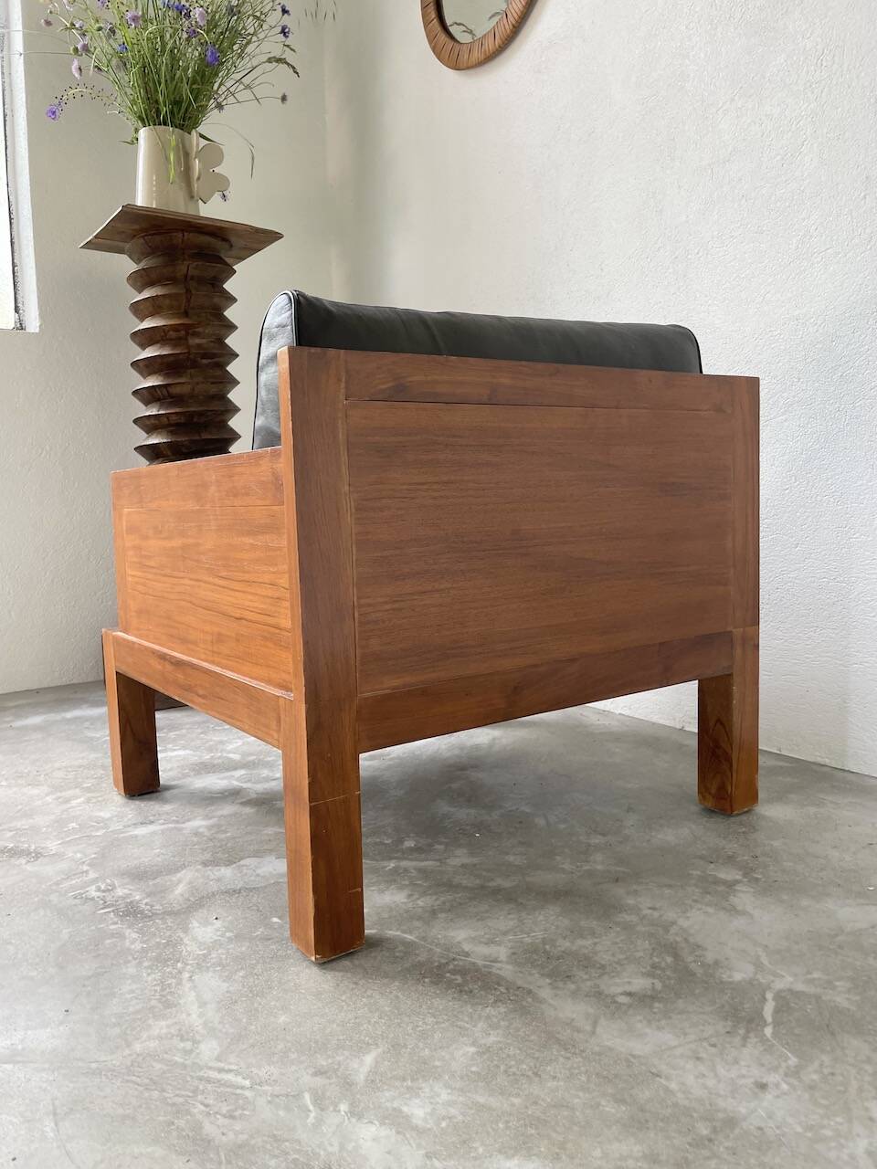 Modernist armchair in exotic wood and leather