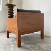 Fauteuil moderniste bois exotique et cuir