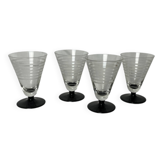 Art déco, quatre verres liqueur rayés sur pied noir vers 1930