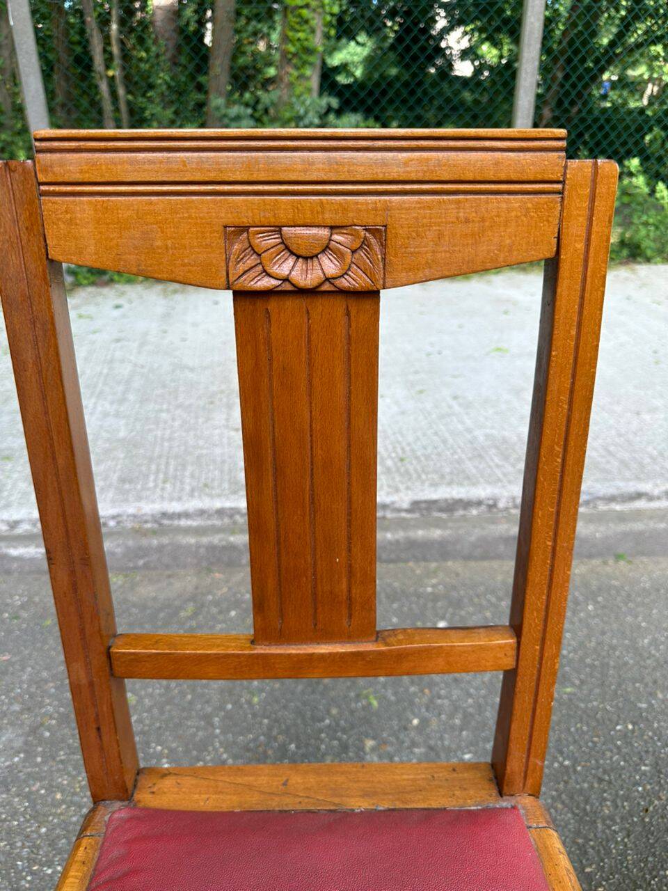Pair of Art Deco chairs in solid oak and burgundy leather from around 1940.