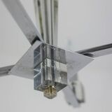 Jacques Adnet. Modernist chandelier in chromed metal. Circa 1940.
