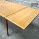 Dining table with oak compass legs