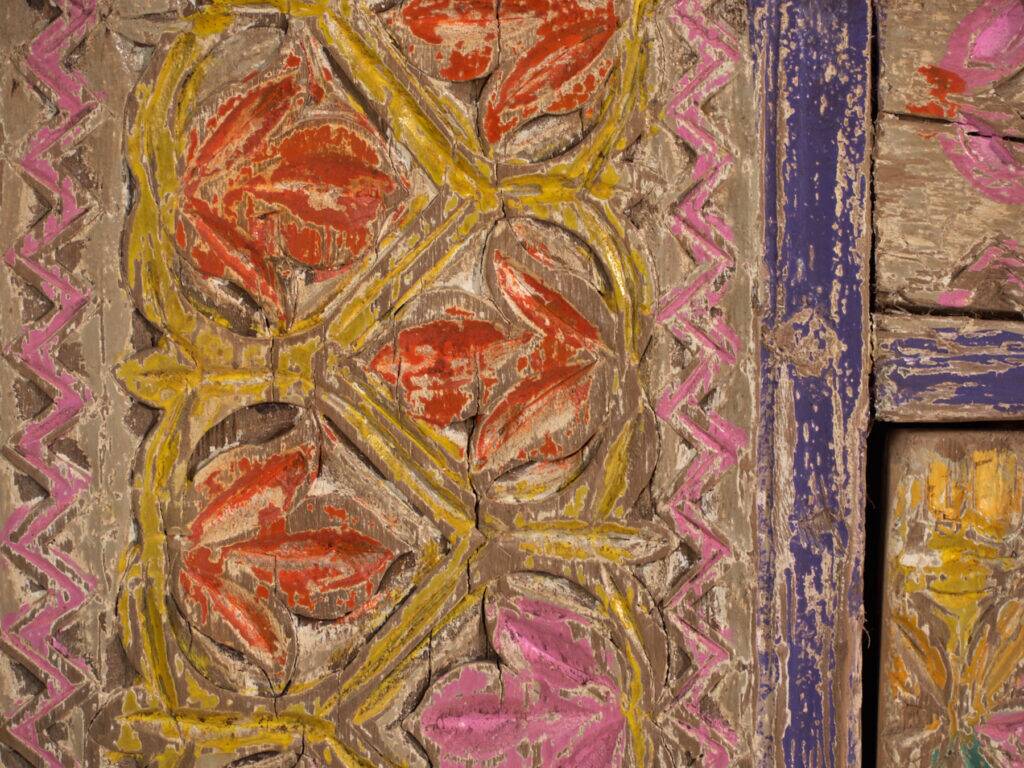 Antique polychrome carved low cabinet in pine – Xinjiang, circa 1900