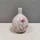A vase in crackled porcelain with pink decoration. Germany 1930s